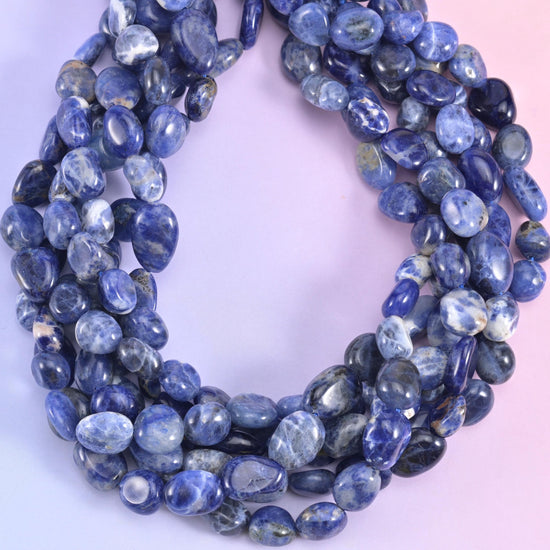 Looped Sodalite nugget strand showing the smooth tumbled polish