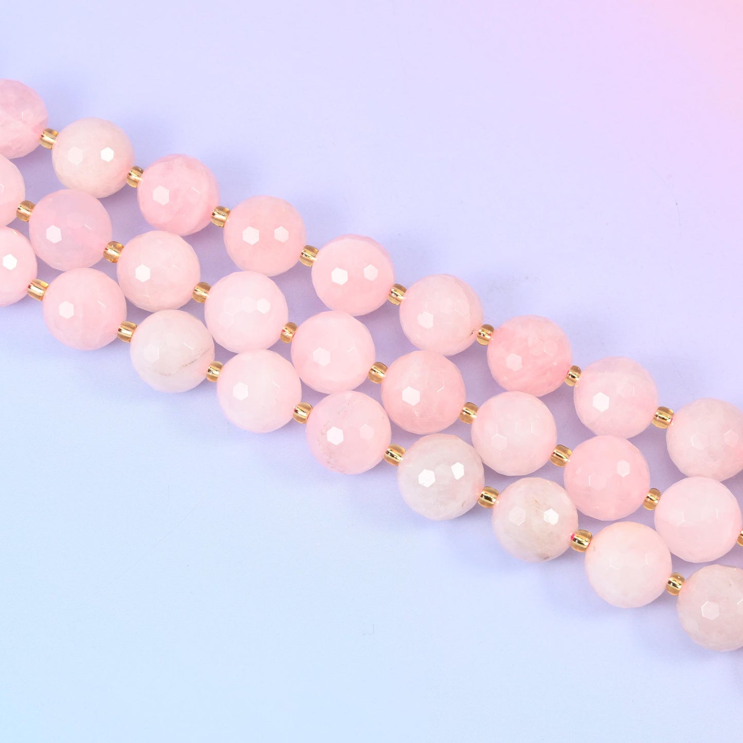 Faceted round cut rose quartz beads
