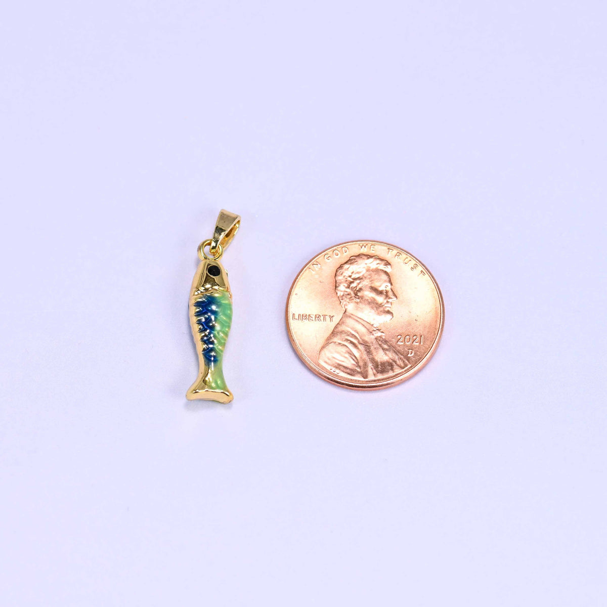 Textured scale cut fish charm pendant