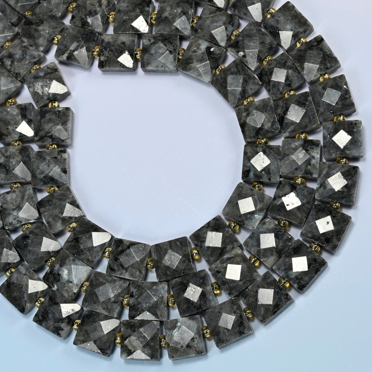 Natural black labradorite faceted flat square beads curved into an open loop, dark gray and black beads with light specks