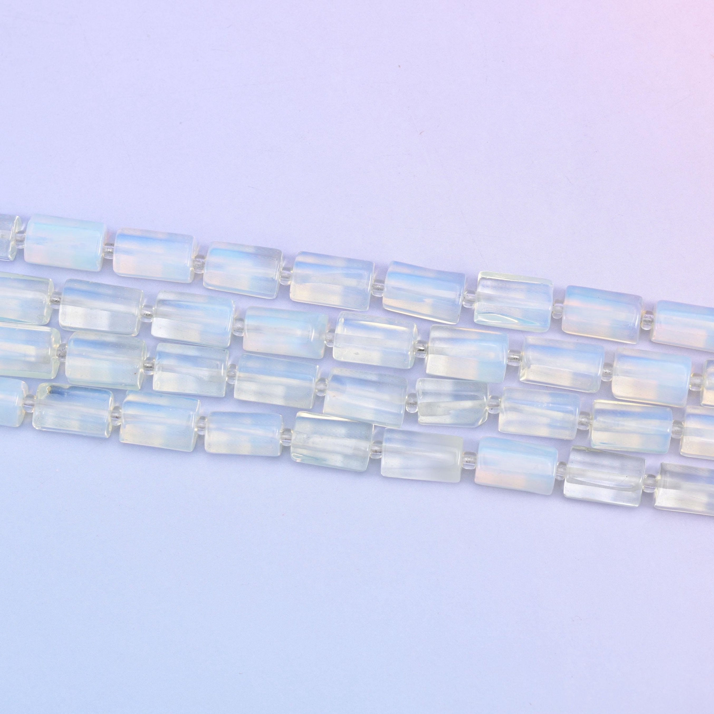 Opalite Faceted Tube Beads in a soft milky glow