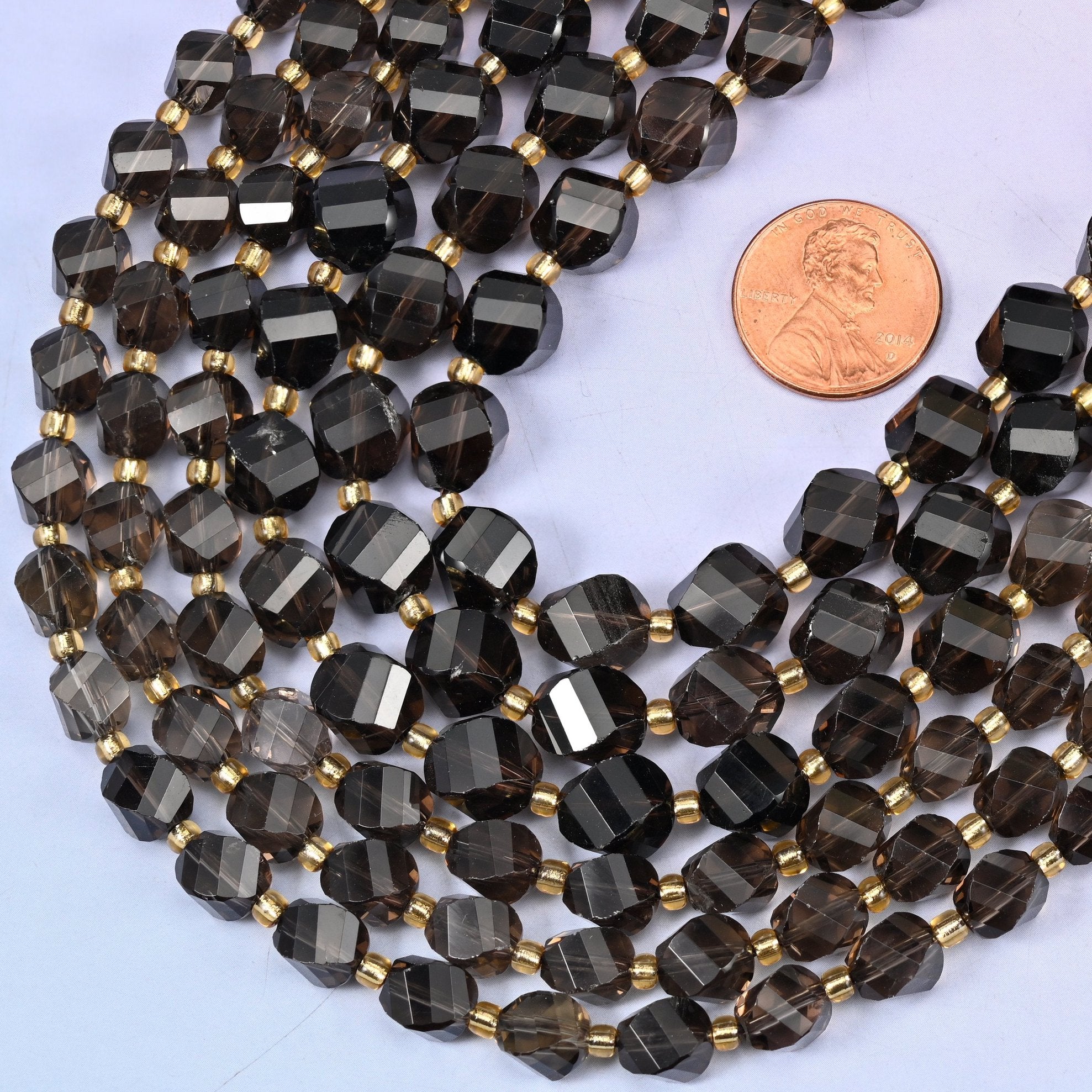 Faceted spiral twist cut Smoky Quartz beads
