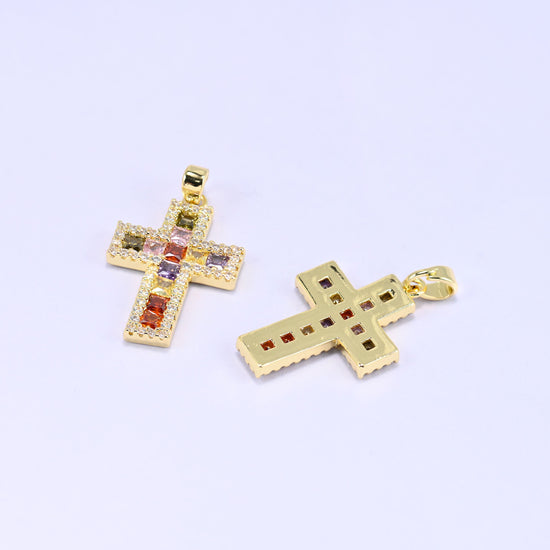 Zirconia cross charm shown front and back, the reverse cut away so the stones show through
