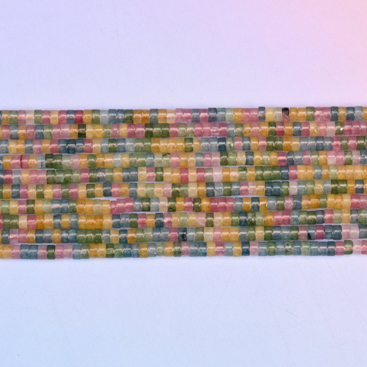Multicolor Fluorite Smooth Heishi Disc Beads in pink, green, golden yellow and blue-gray tones