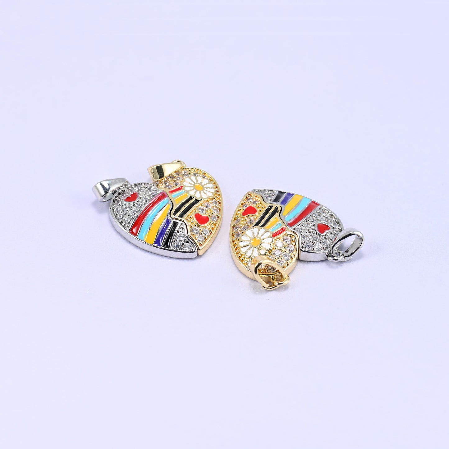 Friendship heart pendant that splits into two magnetic halves, each with its own bail