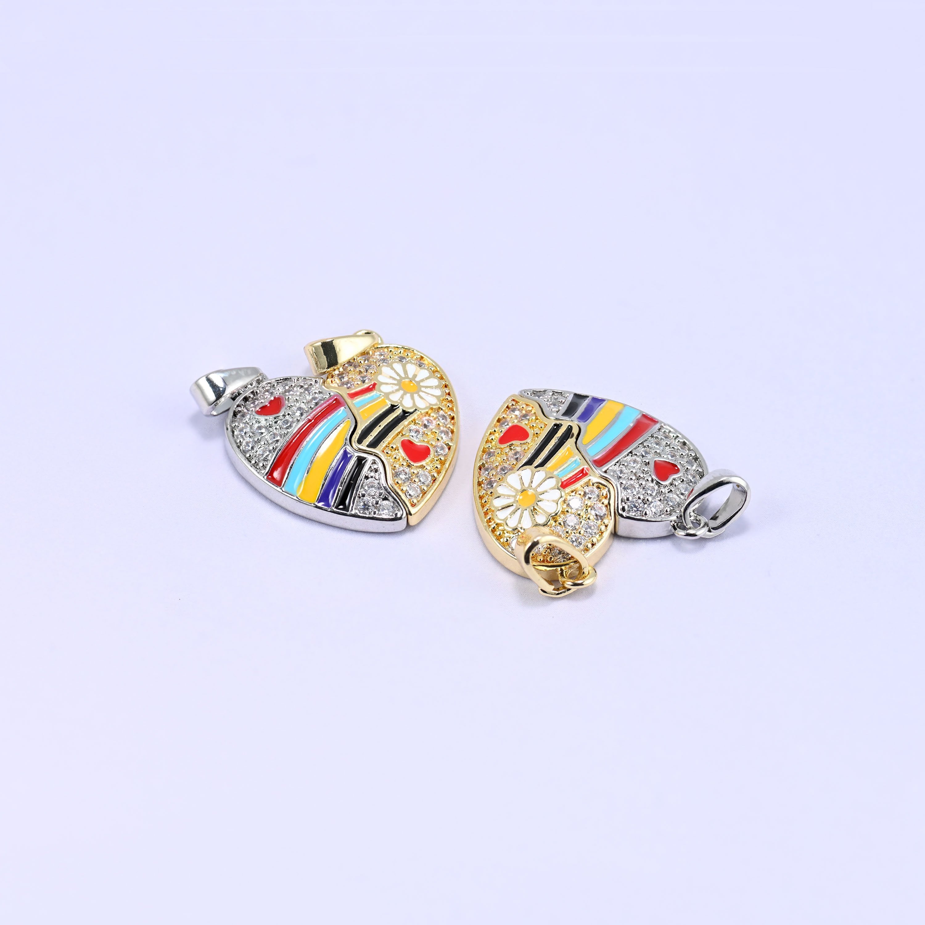 Friendship heart pendant that splits into two magnetic halves, each with its own bail