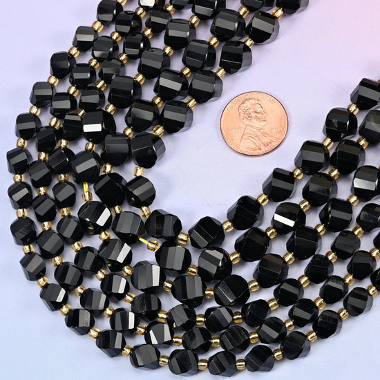 Faceted spiral twist cut black onyx beads