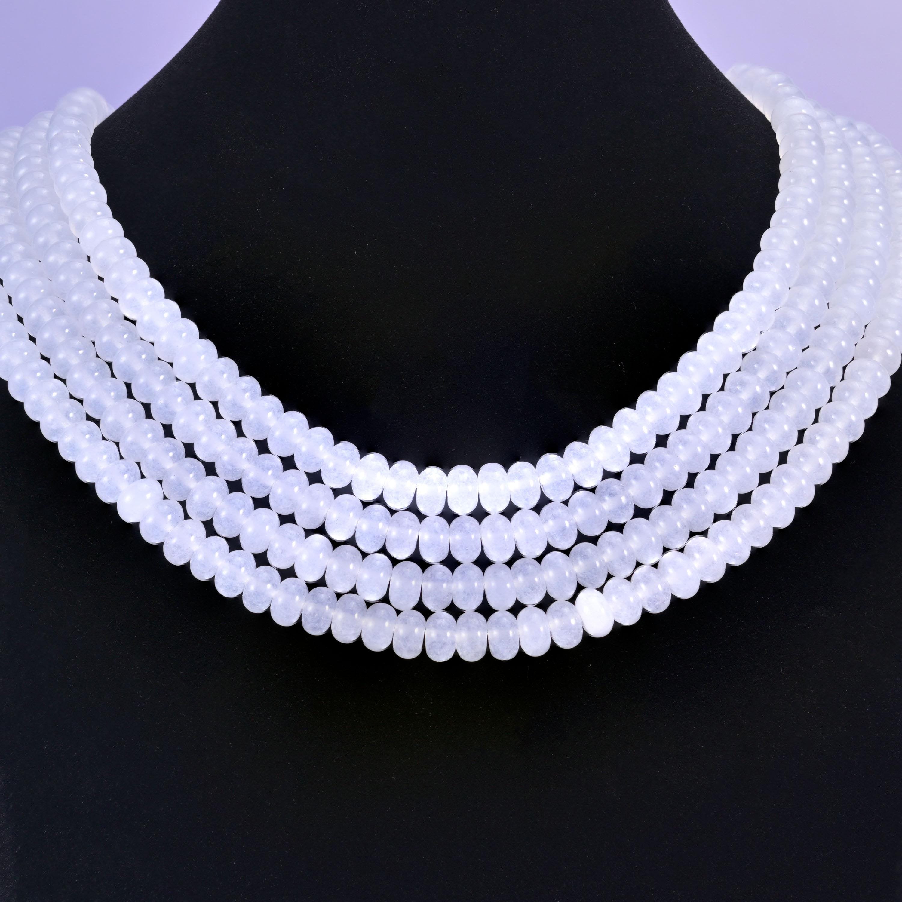 White Dyed Jade beads in a soft, translucent white tone