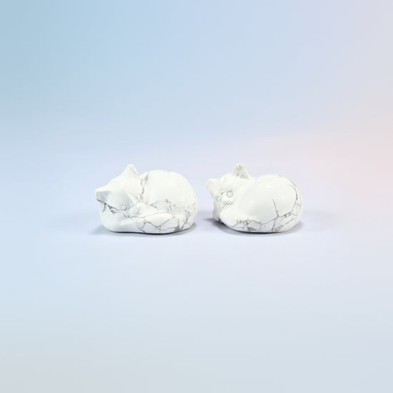 Two natural white howlite sleeping cat crystal carvings, 1.5 inch, white with gray veining