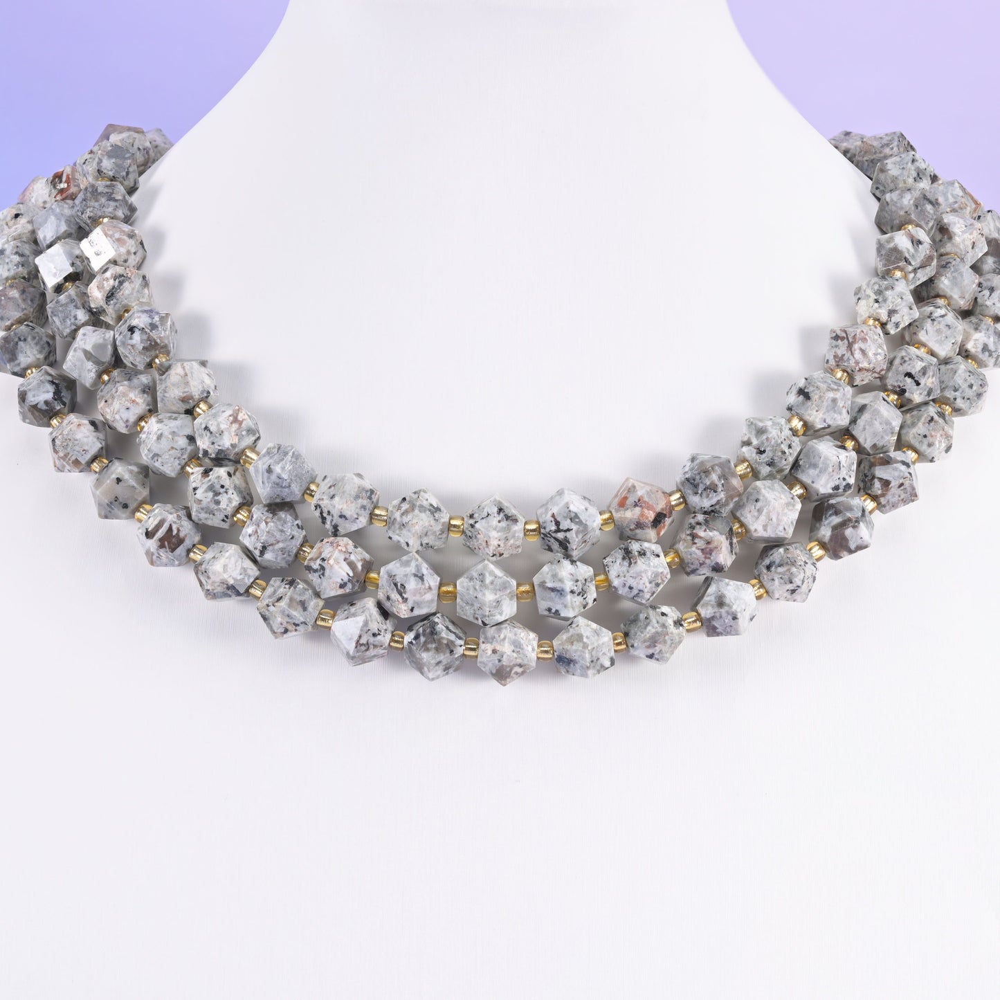 Eight-sided faceted gemstone beads as accent beads in layered designs.