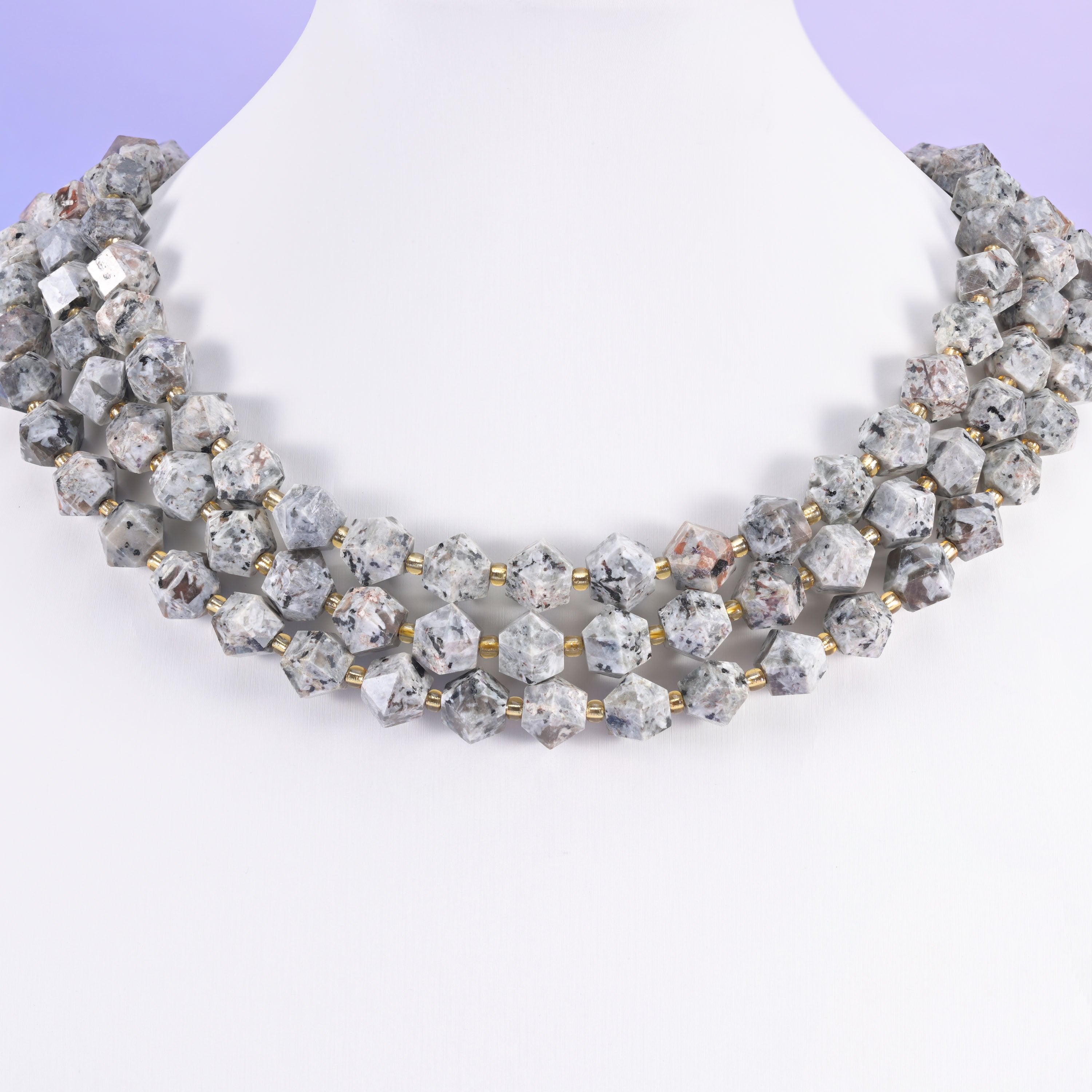 Eight-sided faceted gemstone beads as accent beads in layered designs.
