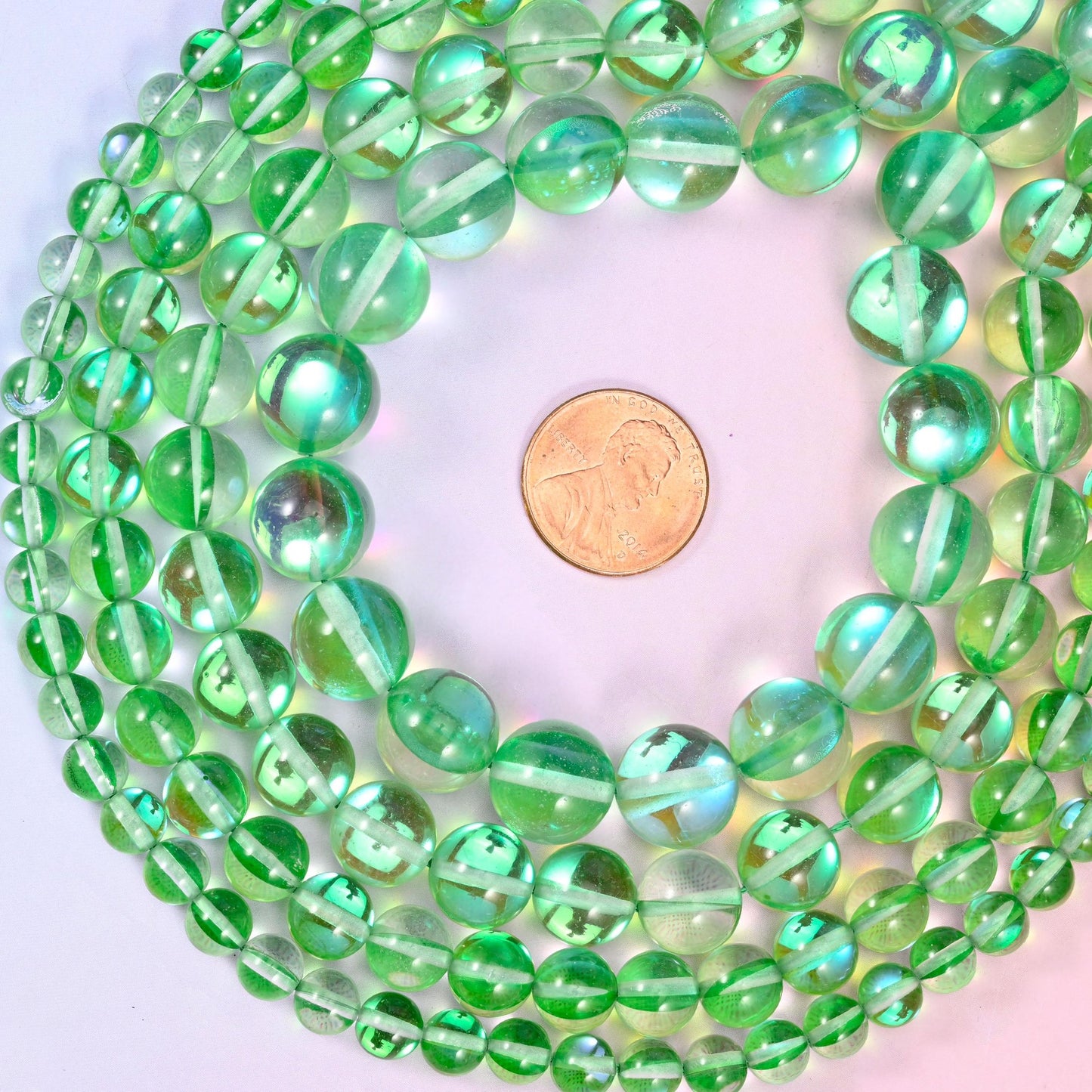 Mystic Aura Green Round Glass Beads, sold per 15 inch strand