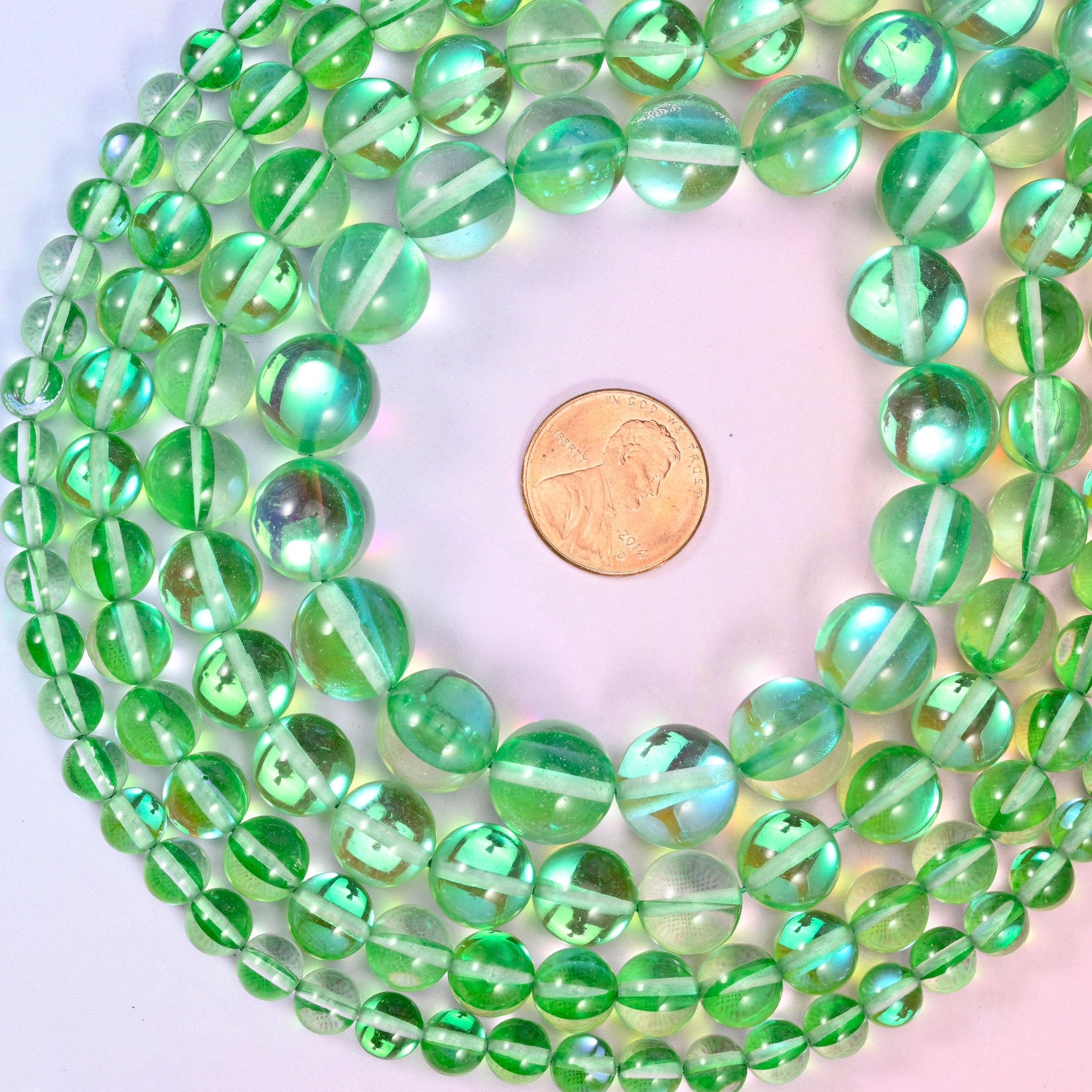 Mystic Aura Green Round Glass Beads, sold per 15 inch strand