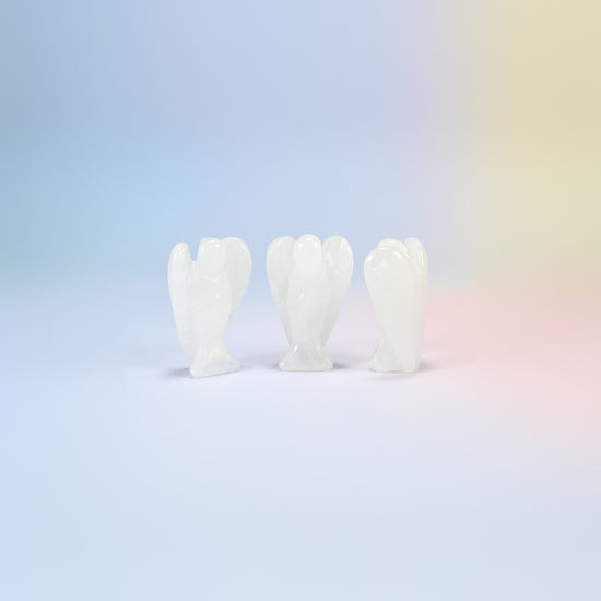 Three natural clear quartz guardian angel carvings, icy white, 2 inch