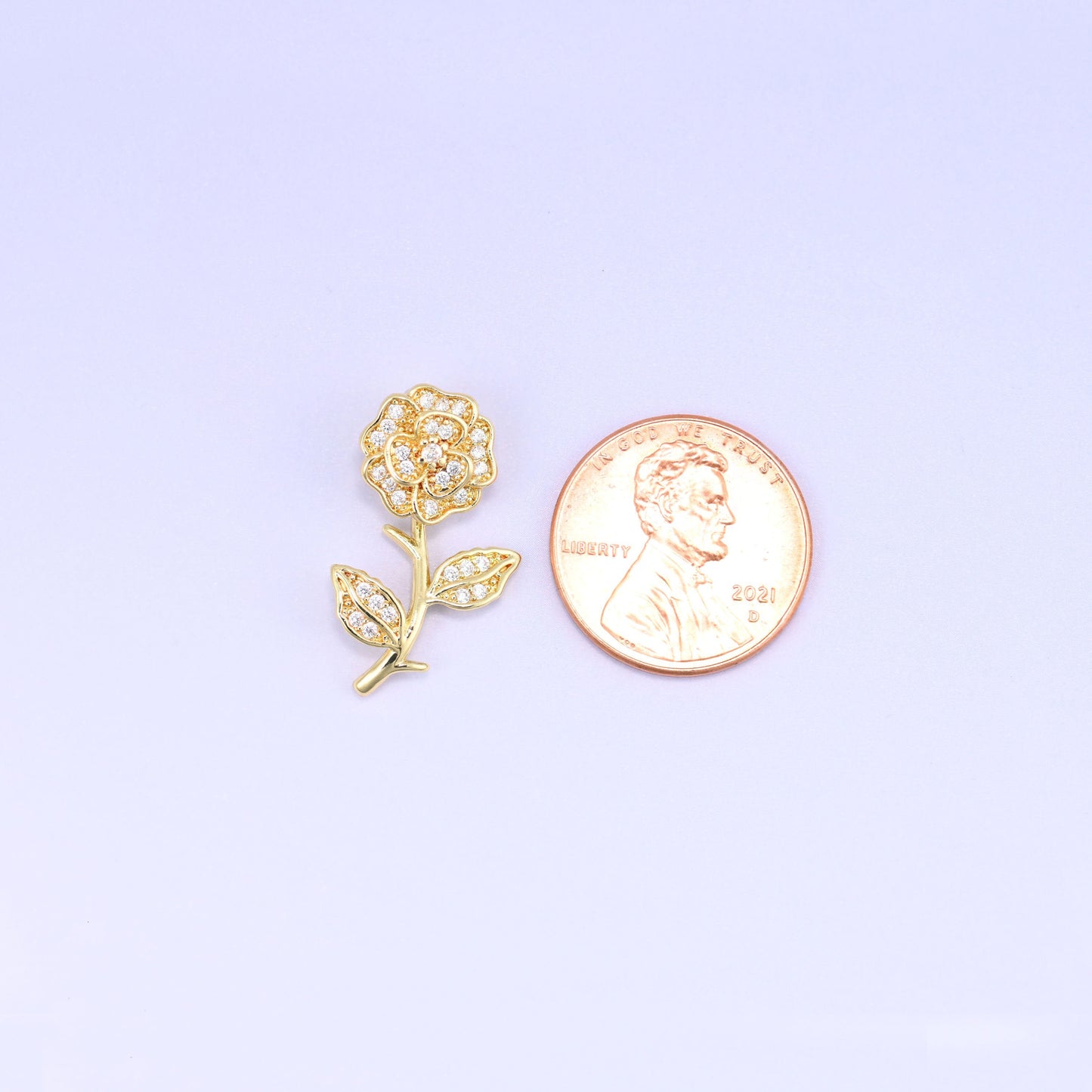 Gold rose zircon charm pendant, sculpted flower and leaf design