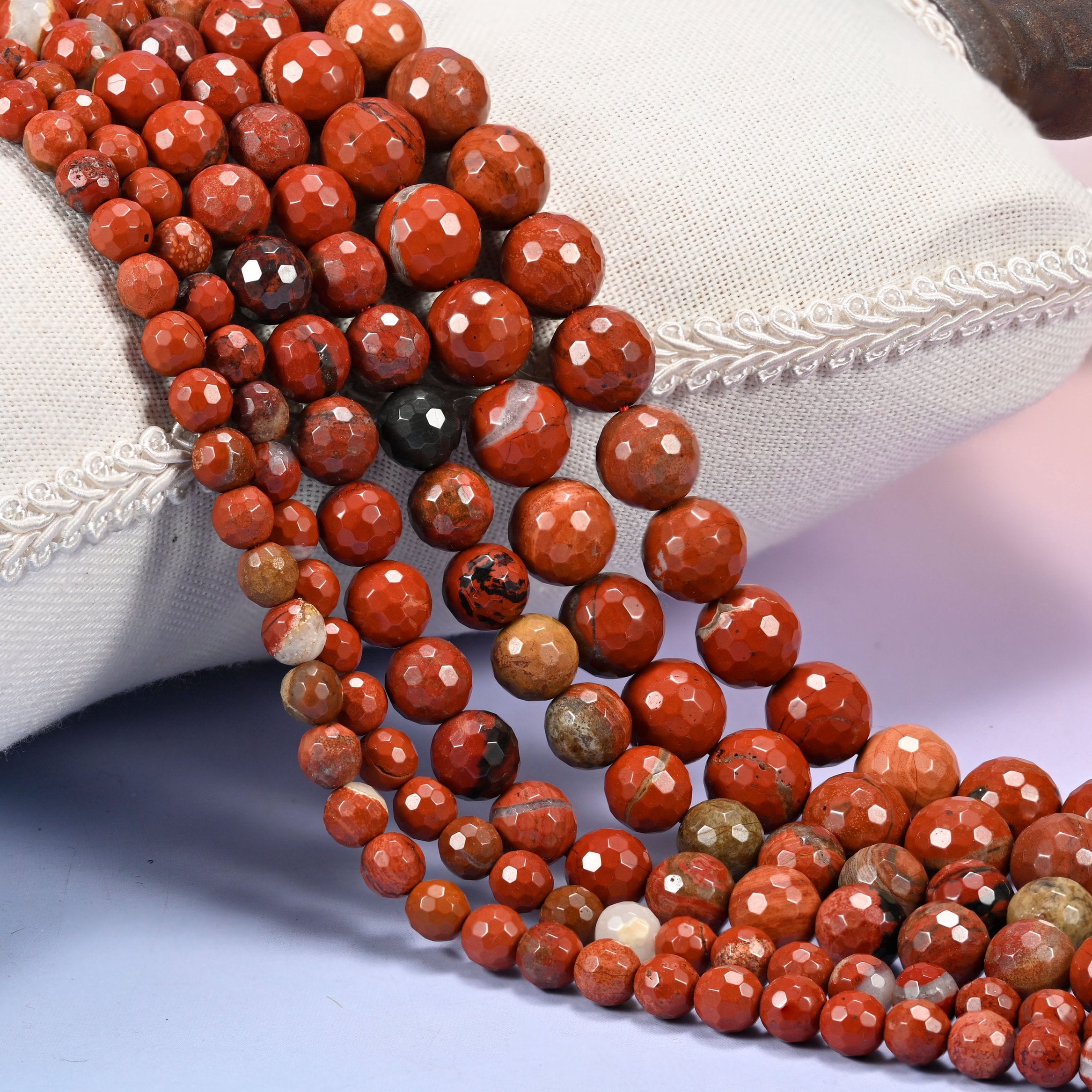 Flower red jasper faceted round beads in 6mm, 8mm, and 10mm, 15-inch strand, for jewelry making.