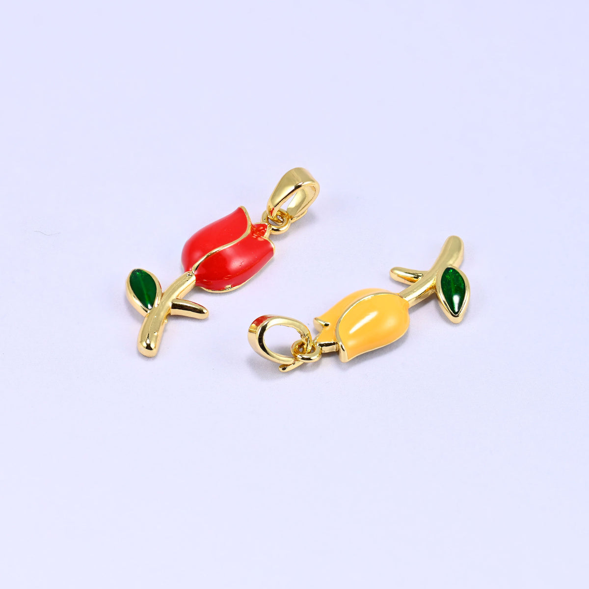 Enamel tulip charms, one red and one yellow 18K gold plated flower pendant side by side