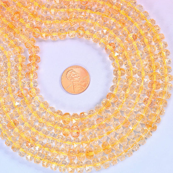Transparent Gold Faceted Rondelle Glass Beads, approximately 82 beads per strand