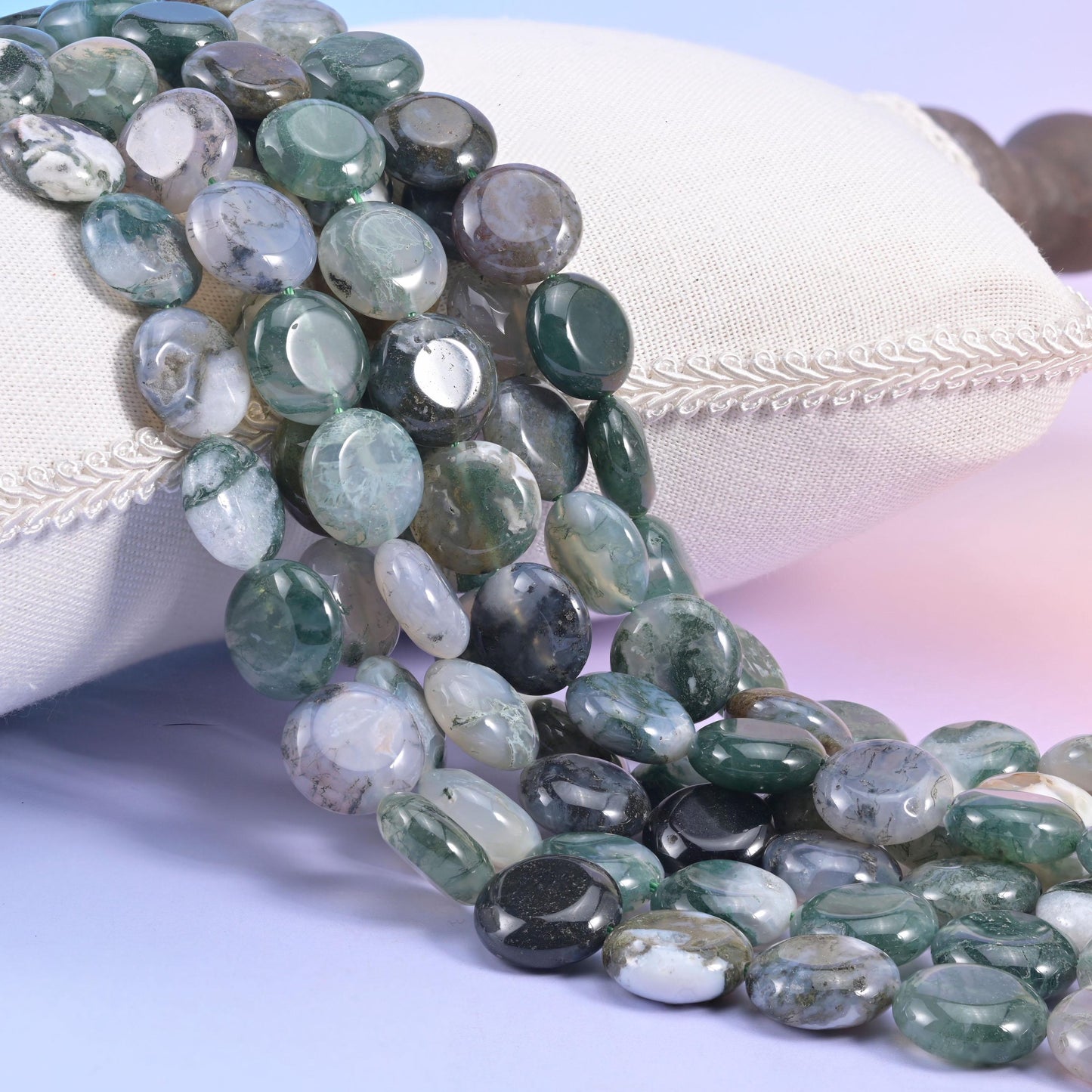 Moss Agate smooth coin beads in milky white and pale sage with dark forest-green moss inclusions