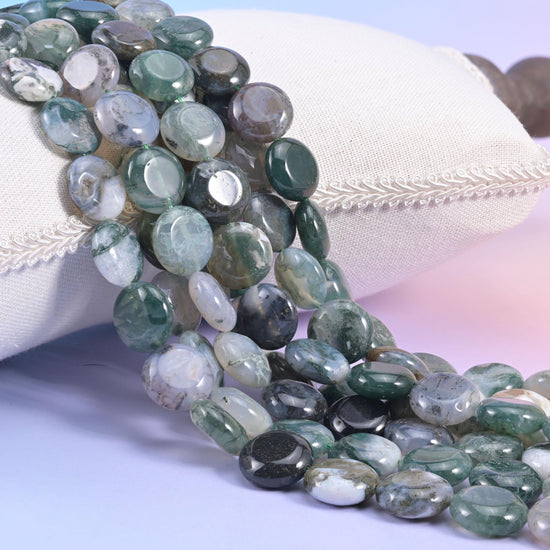 Moss Agate smooth coin beads in milky white and pale sage with dark forest-green moss inclusions