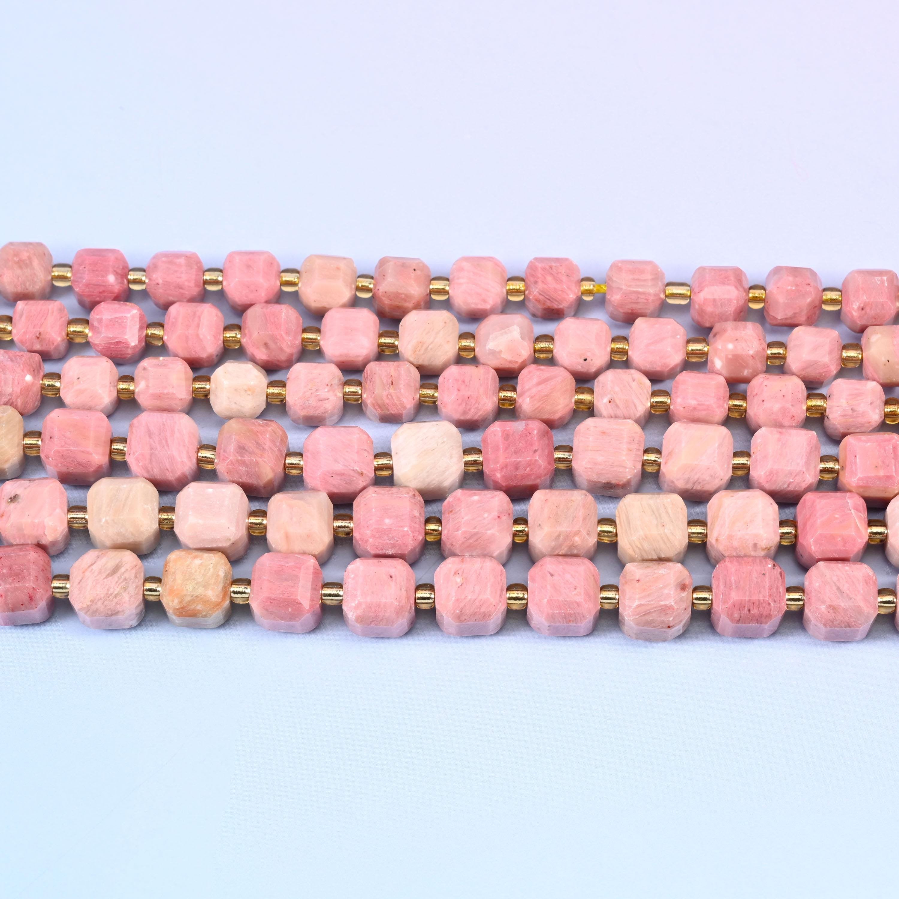 Pink Rhodonite beads in dusty rose with oatmeal cream clouding