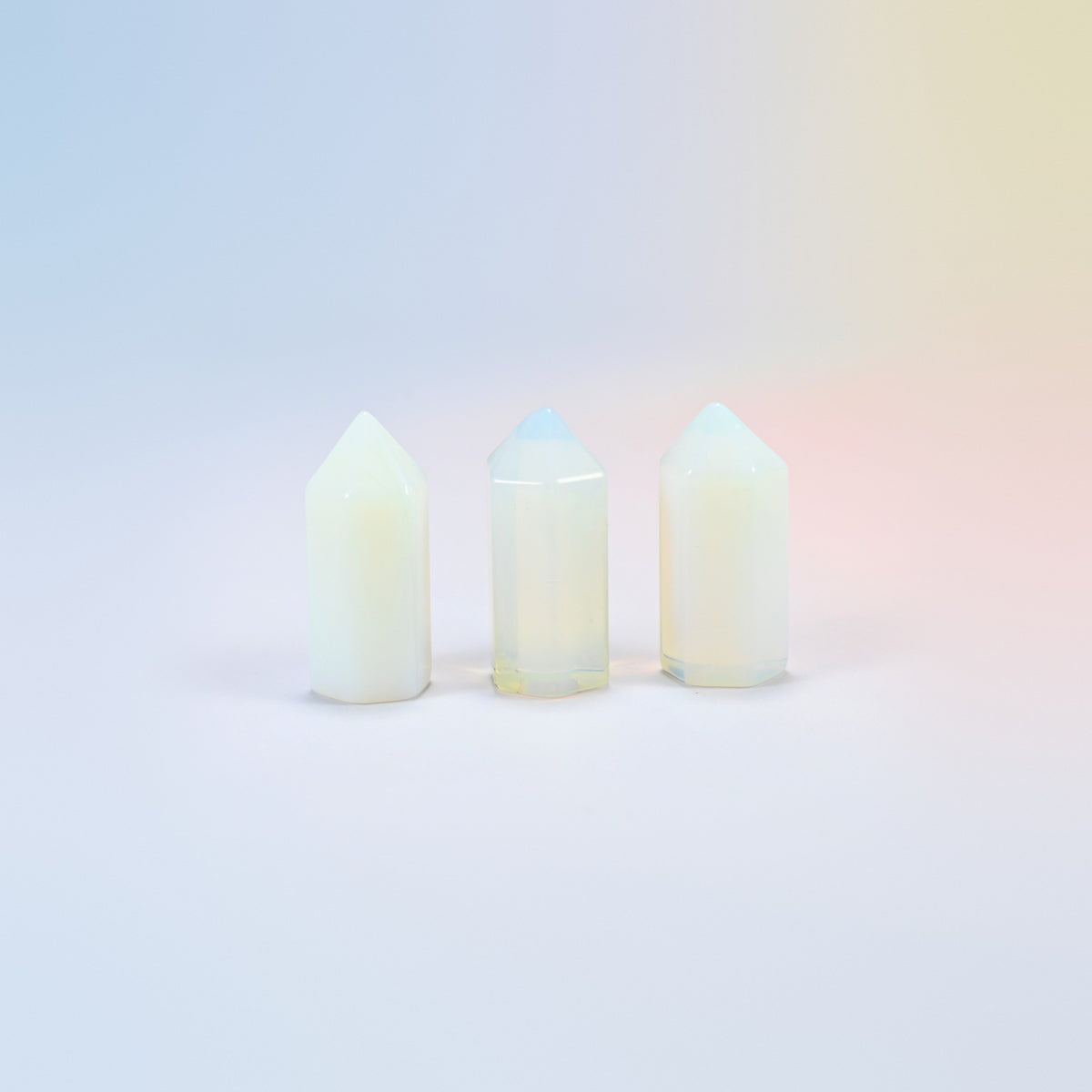 Three opalite small hexagon points, glowing man-made glass