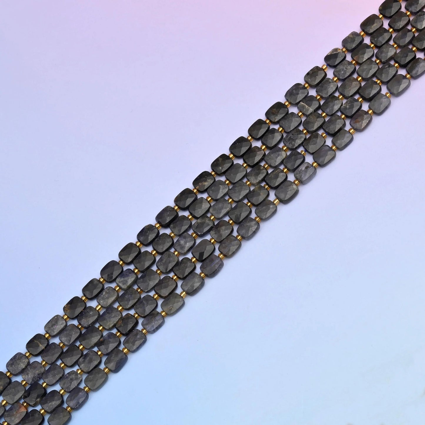Iolite beads in deep smoky violet-grey tones