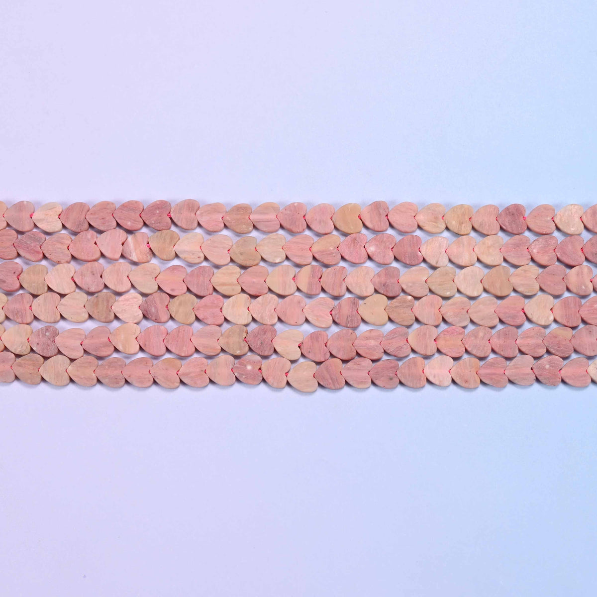 Pink rhodonite beads in dusty rose and antique pink