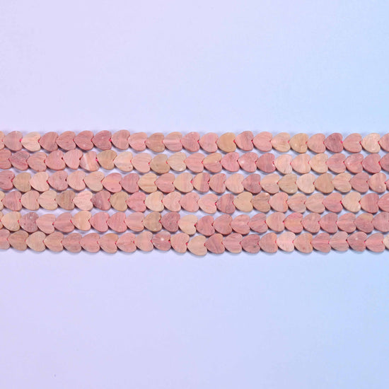 Pink rhodonite beads in dusty rose and antique pink