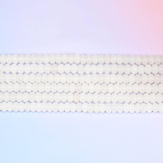 Natural White Jade Rondelle Beads in a smooth, milky white tone.