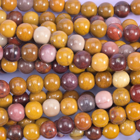 Smooth round cut mookaite jasper beads