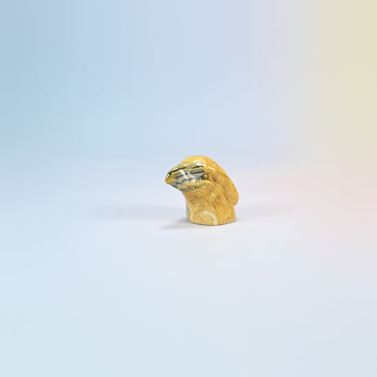 2 inch natural crazy agate eagle head carving, yellow with gray swirls