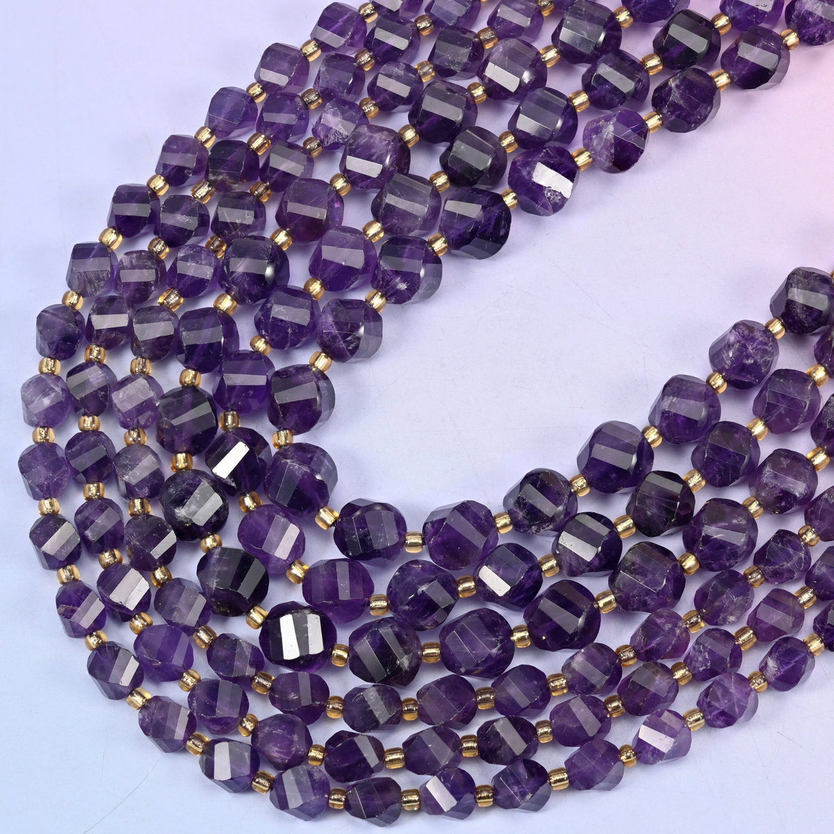 Dark Purple Amethyst faceted spiral twist beads, 15 inch strand