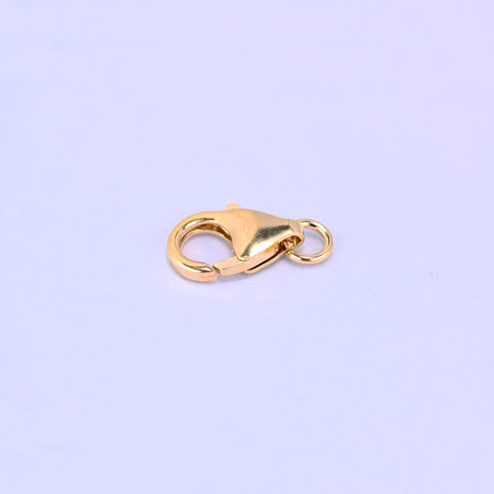 14K gold filled lobster clasp, 7x12mm, three-quarter view with the jump ring at the right
