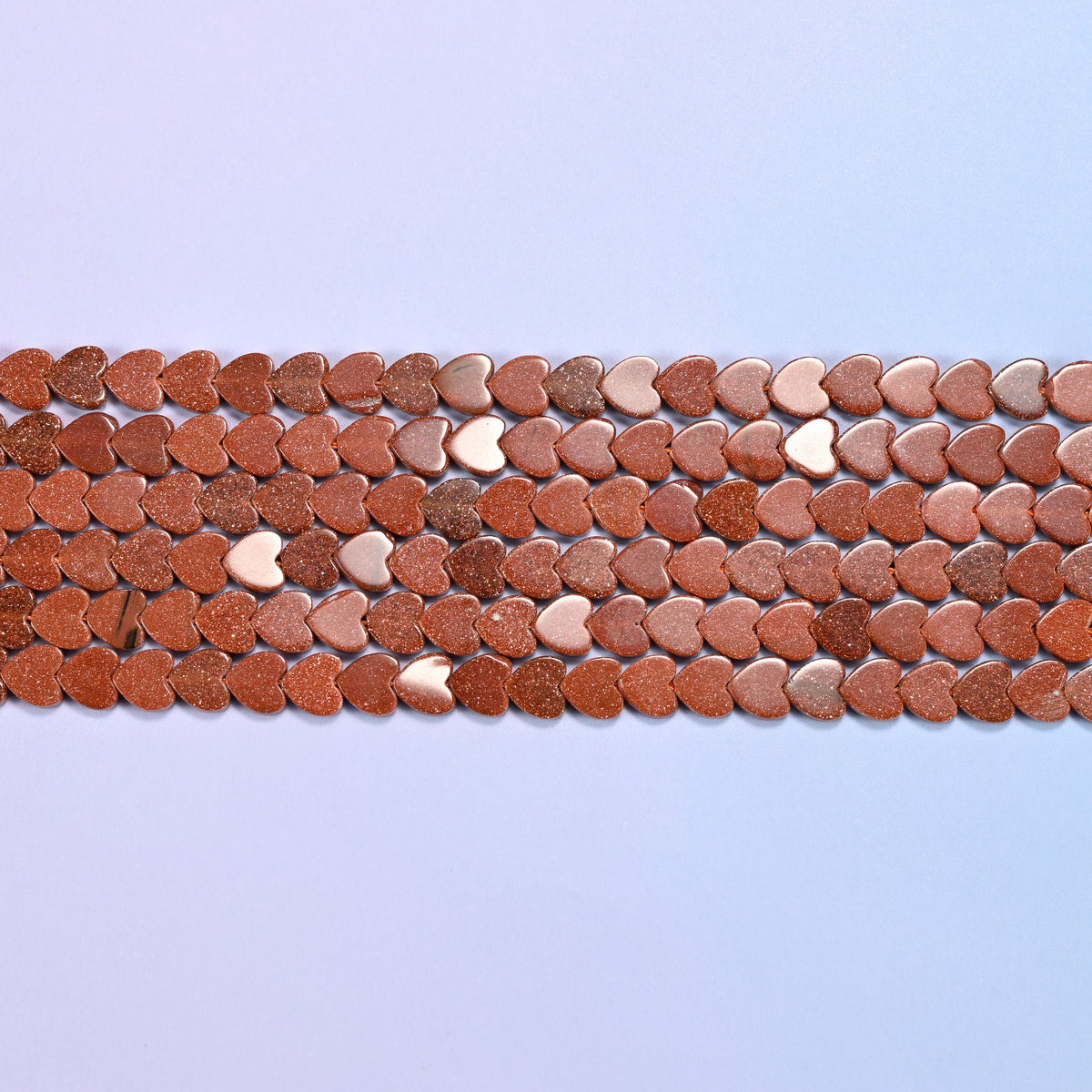 Gold Sandstone Flat Heart Beads in warm copper brown with metallic flecks