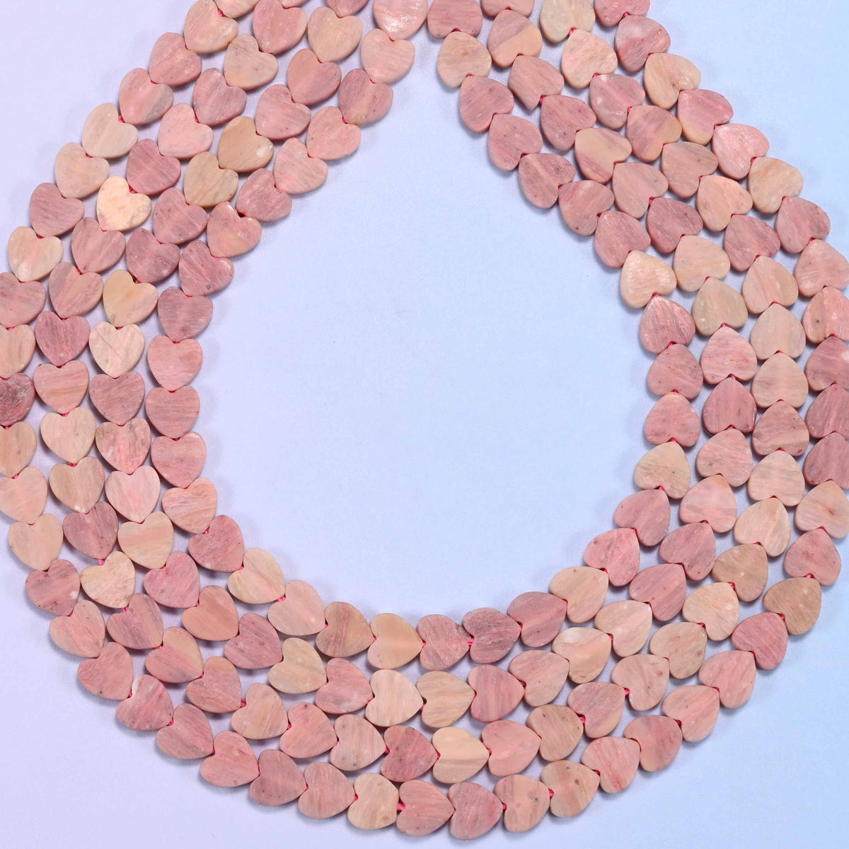 Matte pink rhodonite flat heart beads, hole 0.8mm