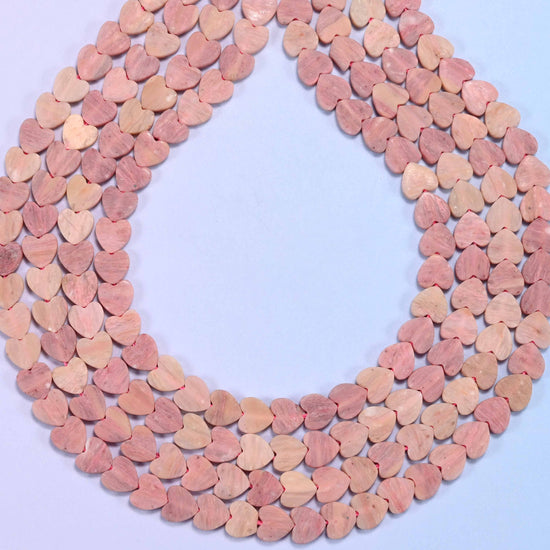 Matte pink rhodonite flat heart beads, hole 0.8mm