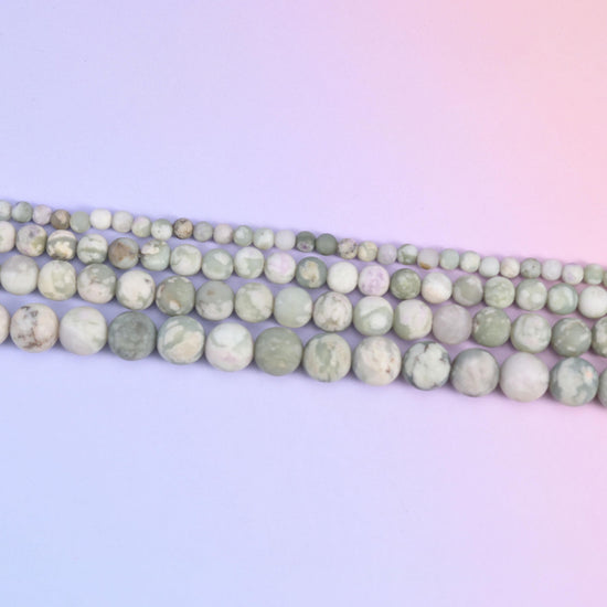 Peace Jasper round beads in pale sage green with grey-brown veining