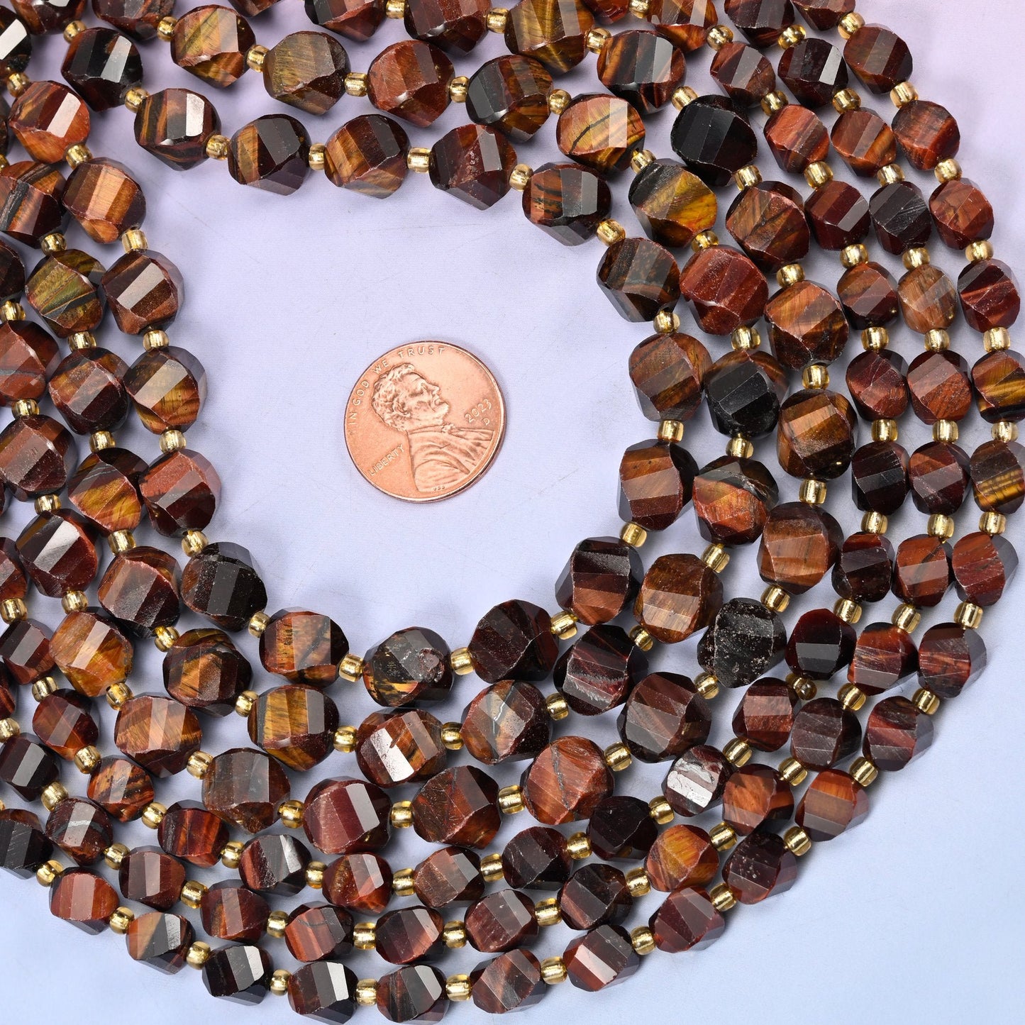 Natural Red Tiger Eye banded with near-black stripes and a silky chatoyant sheen