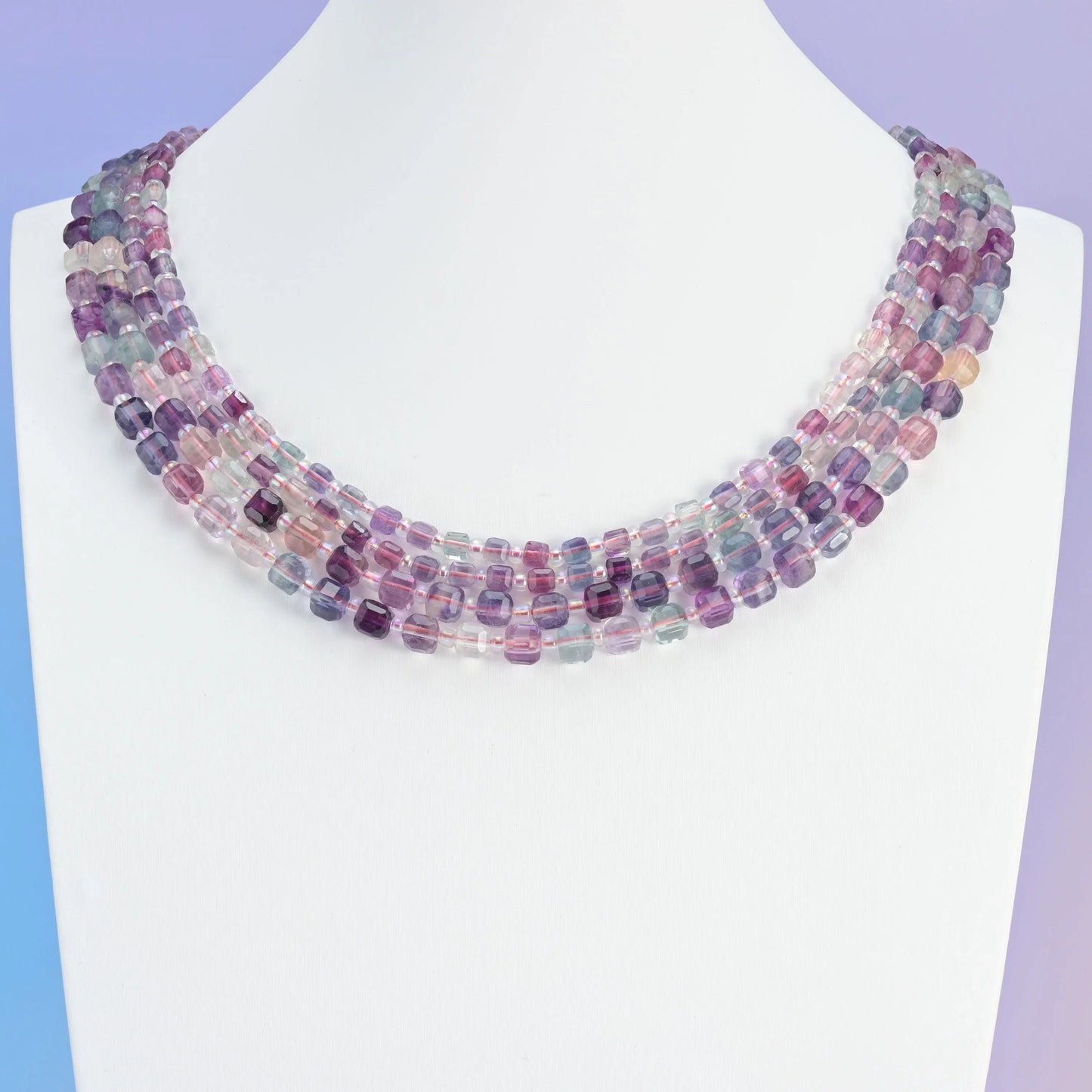 Rainbow Fluorite beads, faceted cube shape.