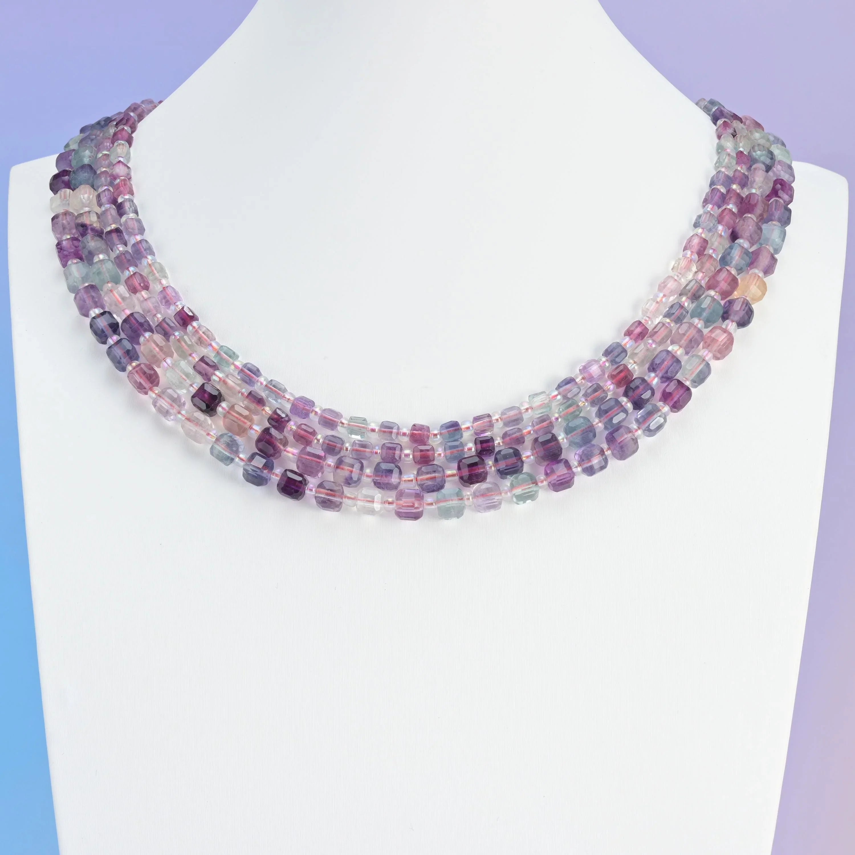 Rainbow Fluorite beads, faceted cube shape.