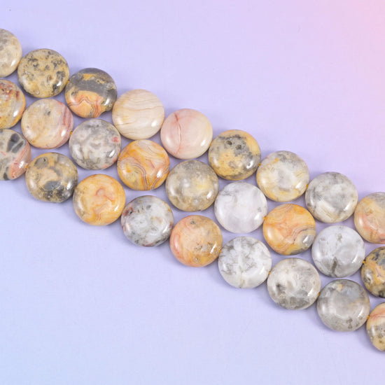 Crazy Agate coin beads in cream, grey, ochre, and dusty pink banding