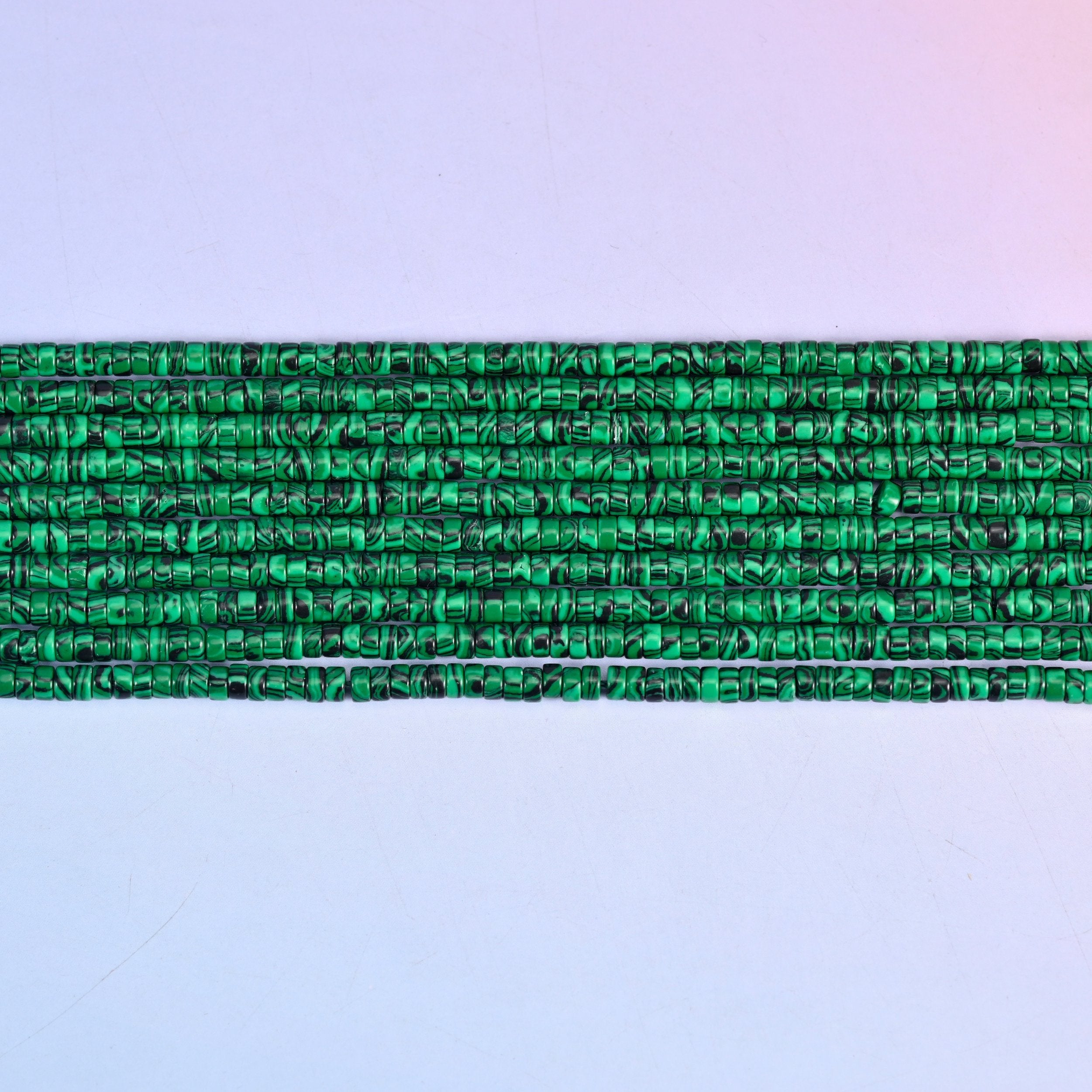 Reconstituted Malachite Smooth Heishi Disc Beads in vivid emerald green