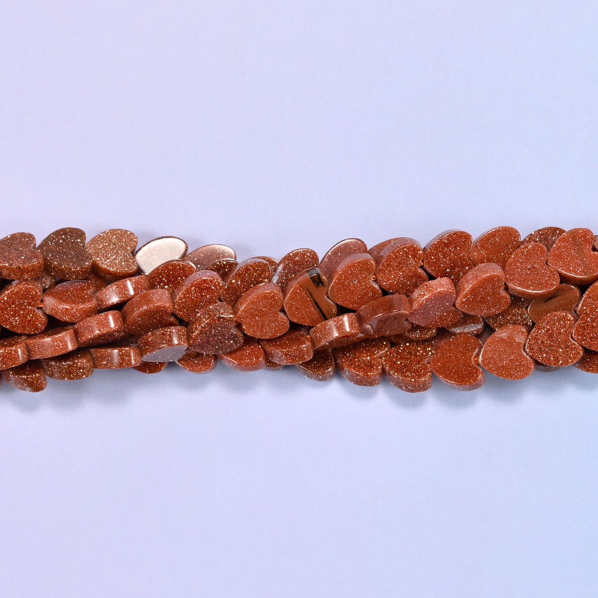Gold Sandstone Flat Heart Beads, approximately 68 beads per strand
