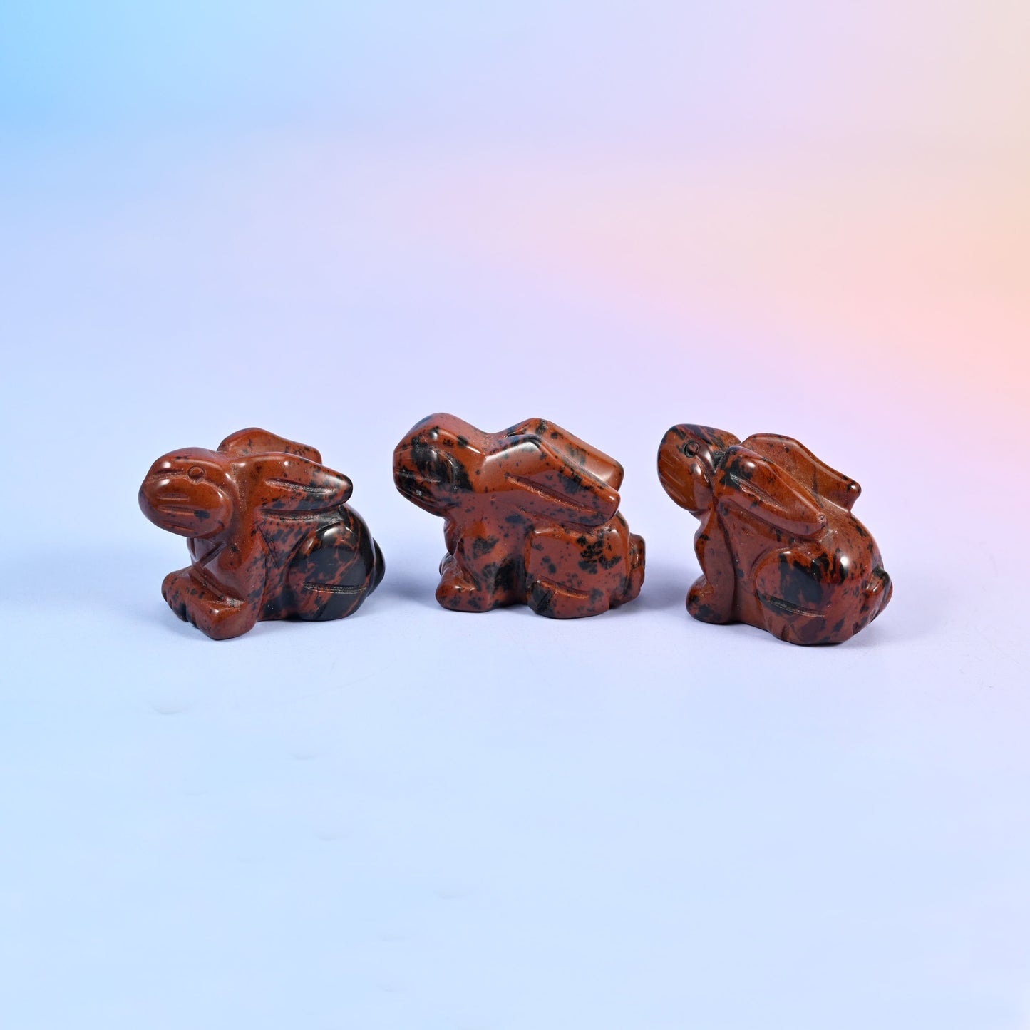 1.5 inch carved stone rabbit figurine, natural stone so veining and colour vary piece to piece