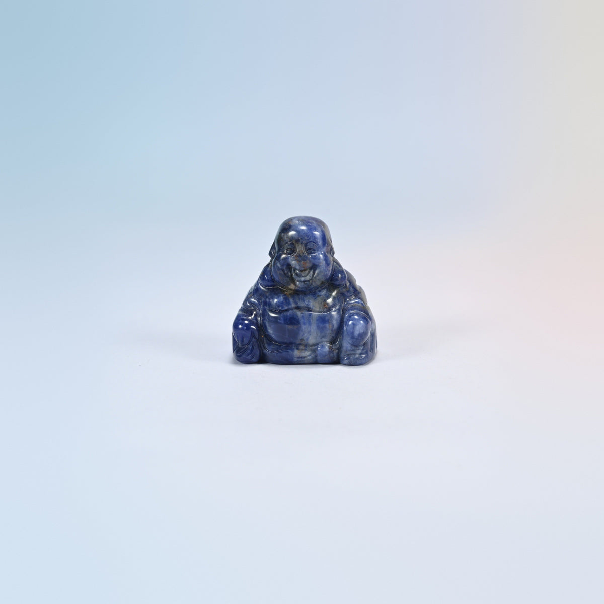 One sodalite laughing Buddha crystal carving, deep blue natural stone with white veins