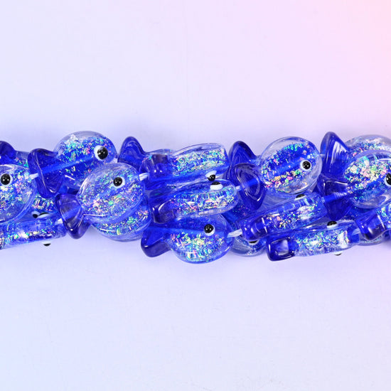 Iridescent Dark Blue Fish Glass Beads, 20 pieces per strand