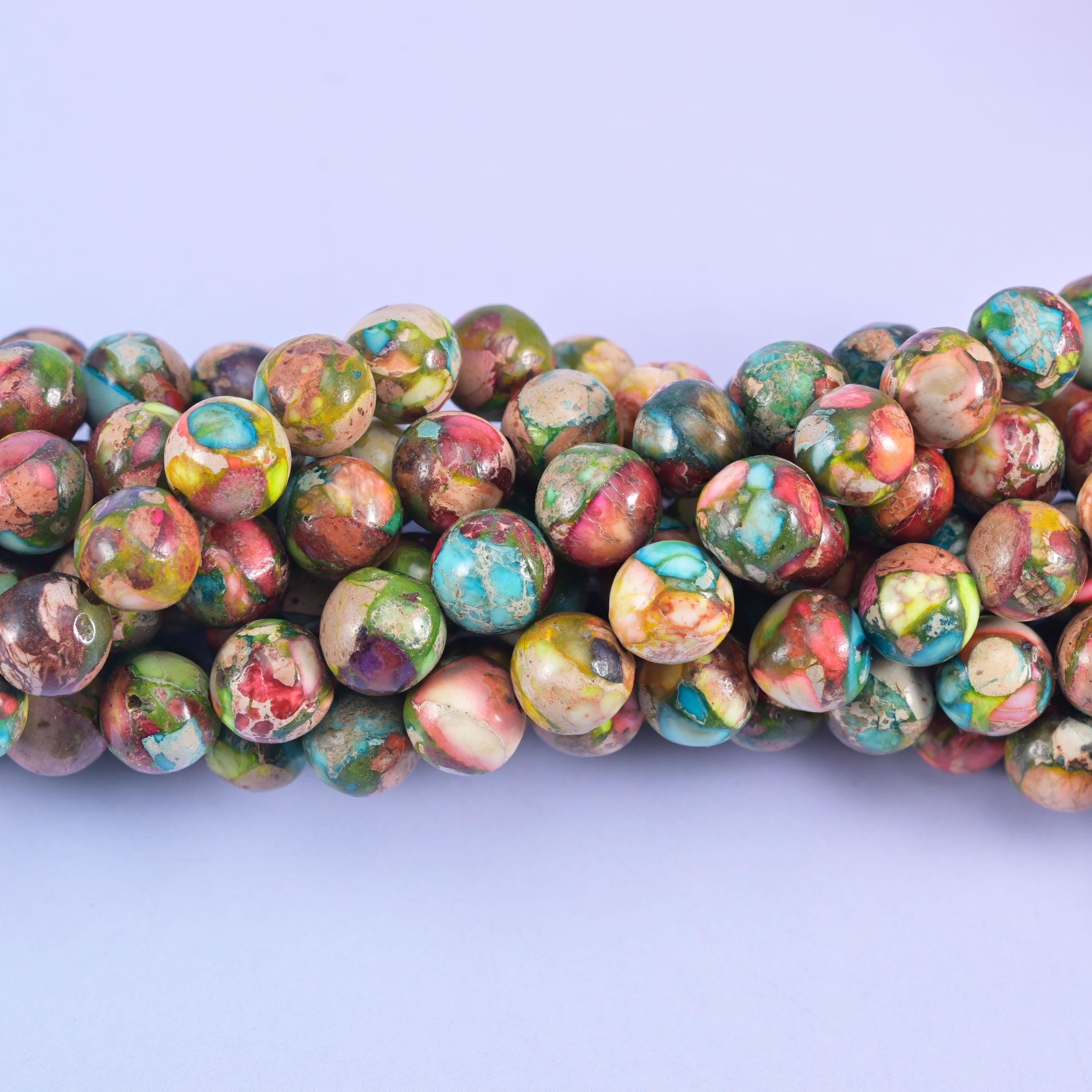 Smooth round cut sea sediment jasper beads (dyed)
