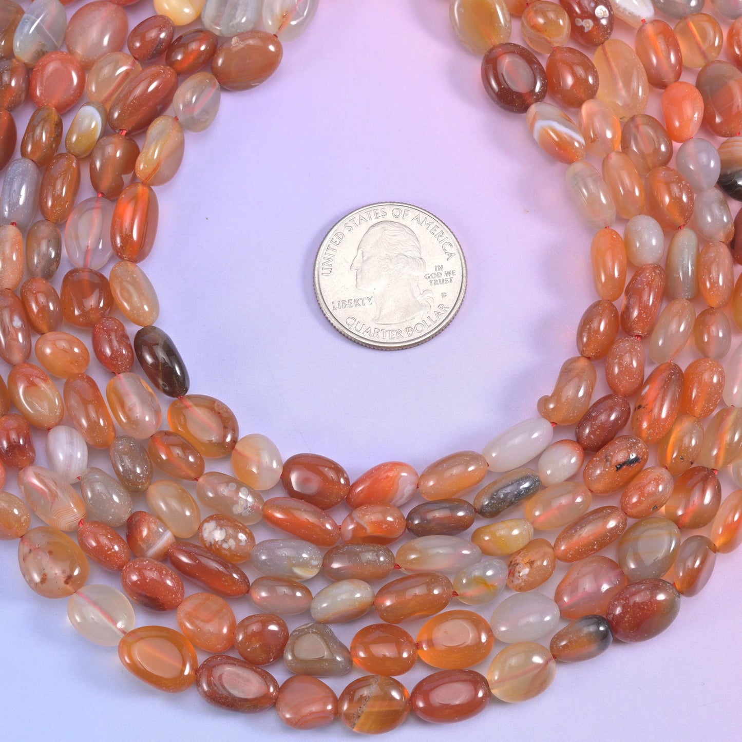 Red Botswana agate pebble nugget beads, approximately 40 beads per strand