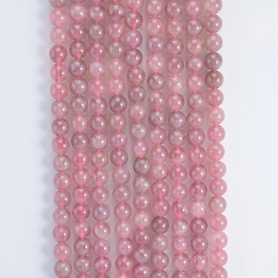 Madagascar Purple Rose Quartz round beads, 15.5 inch strand.